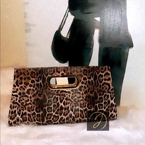 Leopard print vegan leather clutch bag